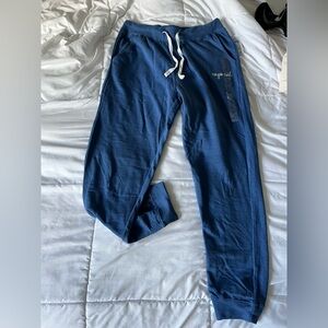 Cuffy’s navy blue sweatpants